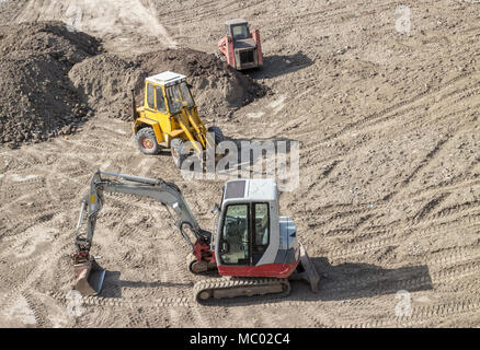 Baustelle, geparkten Bagger auf trockenen Schmutz Stockfoto