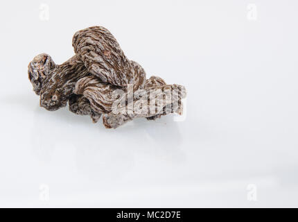 Getrocknet gesalzen Pfirsich (chinesische Pflaume, Japanische Aprikose) Auf dem Hintergrund Stockfoto