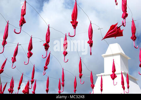 Rote Schirme Mar Stockfoto