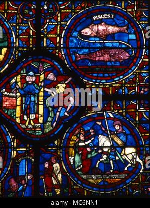 Details von Glasmalereien in der Wand der Kathedrale von Chartres, Frankreich. Stockfoto