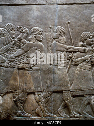 Palast von Assurbanipal, Ninive. Irak. Relief, Rückkehr der Jäger. Obere Mesopotamien. Neuassyrischen Reich, 7. Jahrhundert v. Chr.. British Museum. London, Vereinigtes Königreich. Stockfoto