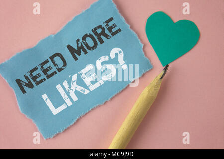 Konzeptionelle Hand schreiben, brauchen mehr Mag. Business Foto präsentiert Social Media erstellen mehr Fans Anhänger Gemeinschaft geschrieben reißen nicht Stockfoto
