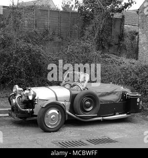 April 2018 - Sammlung von offenen Dreiräder Autos in der Somerset Village von Cheddar. Stockfoto
