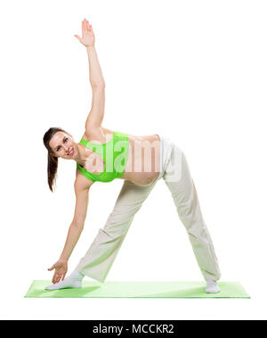 Schwangere Frau, Übung, isoliert auf weißem Stockfoto