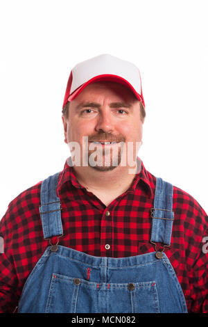 Männliche Arbeiter im bib Overalls, Flanell Hemd und Hut. Stockfoto