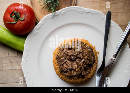 Lammfleisch mit Bulgur Pilaw Reis Pilav oder Stockfoto