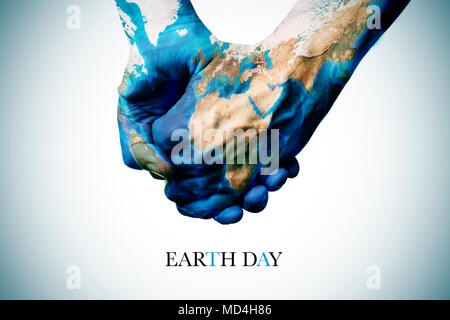 Der Text der Earth Hour und zwei Menschen halten sich an den Händen, gemusterten mit einer Weltkarte (von der NASA ausgestattet) Stockfoto
