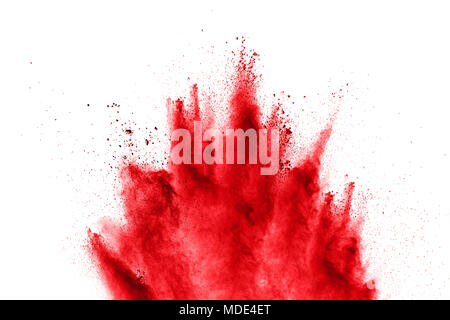 Abstrakt rot Pulver Explosion auf weißem Hintergrund. abstrakt rot Staub auf Hintergrund spritzte. Freeze motion Der rote Pulver spritzen. Stockfoto