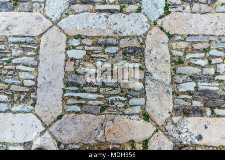 Alte gepflasterte Straße als Hintergrund in der Altstadt der historischen Dorf Erice in Sizilien, Italien Stockfoto
