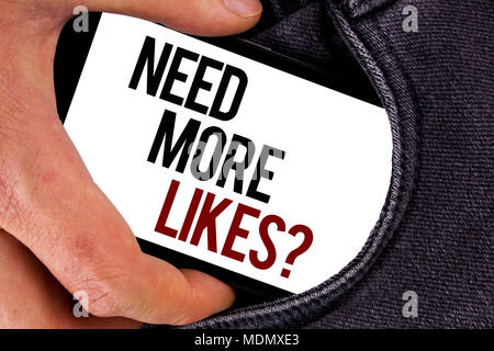 Handschrift text brauchen mehr Mag. Begriff Sinne verbessern erreichen Werbung Marketing SEO Marketing verbessern Mobile Bildschirm geschrieben in der Hand halten Stockfoto