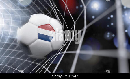 Sehr realistische Wiedergabe von einem Fußball mit der Flagge von den Niederlanden im Netz. (Serie) Stockfoto