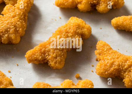 Kinder Dinosaurier geformte Chicken Nuggets bereit zu Essen Stockfoto