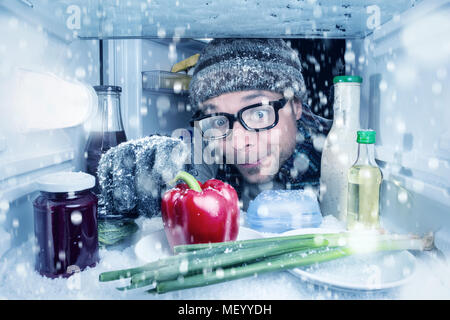 Es schneit im Kühlschrank Stockfoto