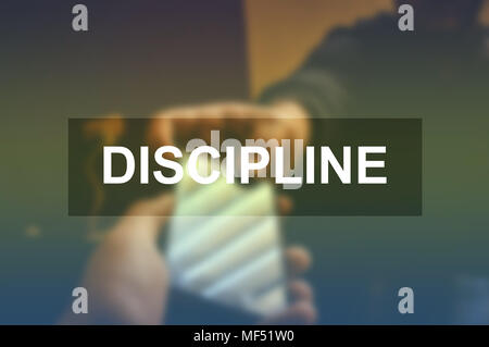 Disziplin Wort mit Unschärfe business Hintergrund Stockfoto