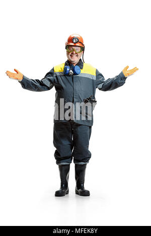 Das Studio von Happy älterer bärtiger Mann bergmann an der Kamera auf einem weißen Hintergrund. Stockfoto