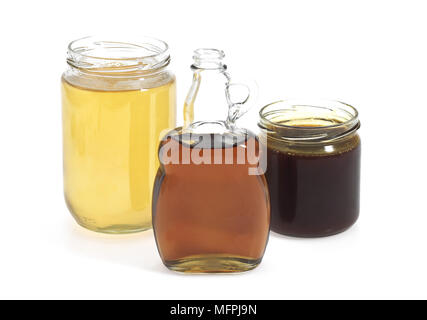 Honig, Melasse und Mapple Sirup Stockfoto