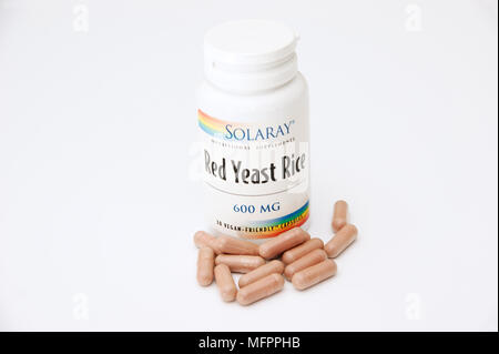 Roter Hefereis Tabletten ein natürliches Heilmittel zur Verringerung des Cholesterinspiegels eine der Kräuterhilfsmittel möglicherweise von Speicher in Großbritannien zu verschwinden und ein Stockfoto