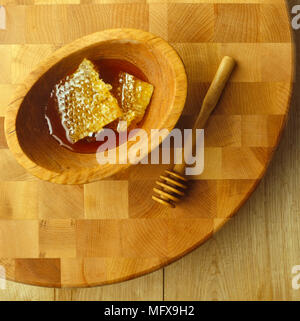 Honig in Houten mit Honig Pendelarm Stockfoto