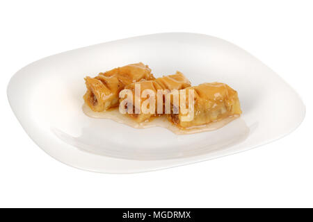 Drei Stücke von süßen Nachtisch roll Baklava, auf weißem Hintergrund Stockfoto