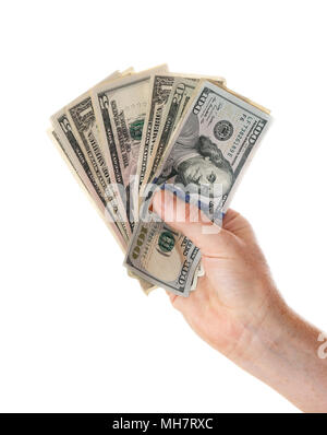 Eine menschliche Hand, die verschiedene US-Dollarnoten wie ein Ventilator auf weißem Hintergrund. Stockfoto