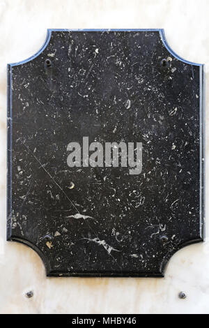 Leere Erbe Platte aus schwarzem Marmor Stein Stockfoto