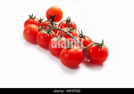 Tomaten cherry Zweig auf weißem Hintergrund. Stockfoto