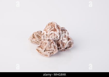 Gesalzene Pflaume Tamarind Snack auf Hintergrund Stockfoto