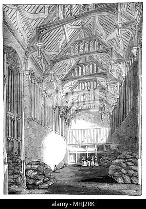 Die große Halle in Eltham Palace, ein großes Haus im Royal Borough von Greenwich, im Südosten von London, England war 1305 Edward II. durch den Bischof von Durham, Anthony Bek, und als königliche Residenz aus dem 14. bis ins 16. Jahrhundert verwendet. Offensichtlich sind sich der Vorfall, Edward III Grundlage der Bestellung des Strumpfband inspiriert fanden hier statt. Edward IV. erbaut die Große Halle in der 1470 s und eine junge Heinrich VIII. als er als Prinz Henry auch bekannt wuchs hier auf; es war hier im Jahr 1499, traf er beeindruckt und der Gelehrte Erasmus, der ihm von Thomas mehr eingeführt. Stockfoto