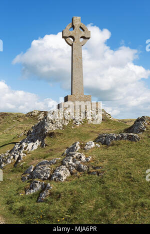Das keltische Kreuz auf llanddwyn Island, Anglesey, North Wales, UK Stockfoto