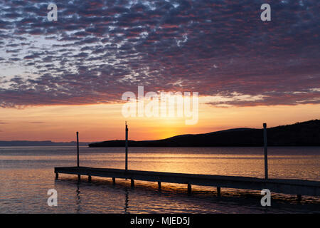 Jetty und Meer bei Sonnenuntergang, La Paz, Baja California Sur, Mexiko Stockfoto