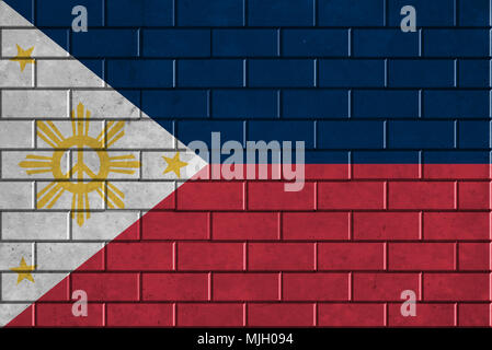 Flagge Philippinen malte auf eine Mauer aus Stein Stockfoto