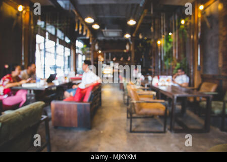 Blur oder Defocus Image der Coffee Shop oder Cafeteria für den Einsatz als Hintergrund Stockfoto