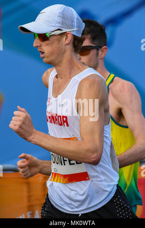 GOLD COAST, Australien - 8 April: Evan Dunfee von Kanada konkurrieren in der Männer 20 k Spaziergang an der Gold Coast 2018 Commonwealth Games in Carrara Stadium auf Stockfoto