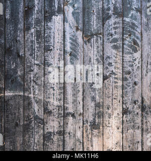 Hintergrund, bestehend aus alten Braun Grau grungy Teil der hölzernen Scheune Tür Stockfoto