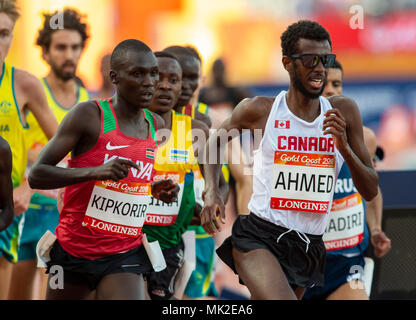 GOLD COAST, Australien - 8 April: Mohammed Ahmed von Kanada konkurrieren in der Männer 5000 m-Finale bei den Gold Coast 2018 Commonwealth Games in Carrara Stad Stockfoto