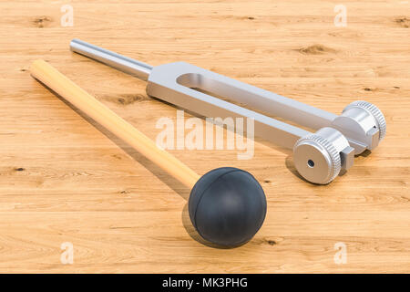 Stimmgabel mit Silikon Hammer auf den Holztisch, 3D-Rendering Stockfoto