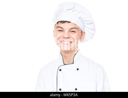 Teenboy tragen Chef uniform Stockfoto