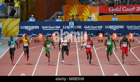 GOLD COAST, Australien - 8 April: Warren Fraser, Nigel Ellis, Akani Simbine, Harry Aikines-Aryeetey, kemar Hyman, Seye Ogunlewe, Keston Bledman Wettbewerber Stockfoto