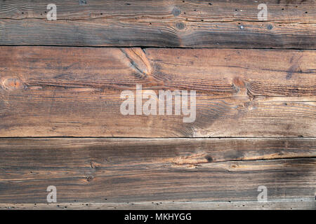 Altes holz Struktur, Holz Muster, Plank, Board. 200 Jahre alte hölzerne Wand. Scharfe, gut sichtbares Wachstum Ringe, parallele Linien und Kurven. Stockfoto