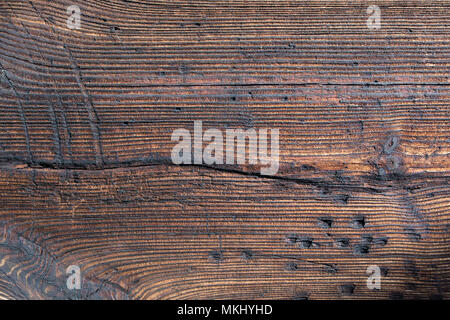 Altes holz Struktur, Holz Muster, Plank, Board. 200 Jahre alte hölzerne Wand. Scharfe, gut sichtbares Wachstum Ringe, parallele Linien und Kurven. Stockfoto