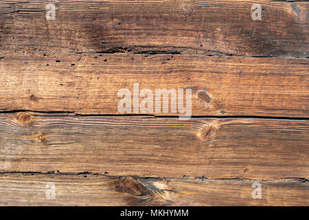 Altes holz Struktur, Holz Muster, Plank, Board. 200 Jahre alte hölzerne Wand. Scharfe, gut sichtbares Wachstum Ringe, parallele Linien und Kurven. Stockfoto