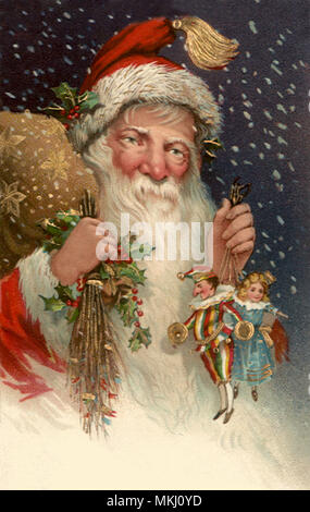 Closeup Santa mit Puppen Stockfoto