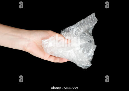 Kunststoff Luftpolsterfolie Pe-Paket Material in der Hand. Recycling, Strom, Umwelt und Ökologie Konzept Stockfoto
