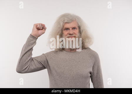Netter älterer Mann seine Hand halten Stockfoto