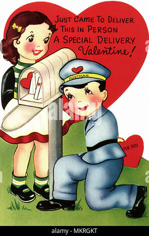 Mädchen mit postboten und Mailbox Valentine Stockfoto