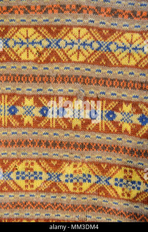 Eine Vielzahl von traditionellen Shetland Fair Isle Muster in Jumper und Hüte auf den Shetland Inseln gemacht Stockfoto