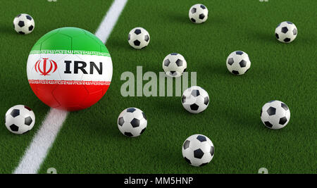 Fußball in Irans nationalen Farben auf einem Fußballfeld. 3D-Rendering Stockfoto