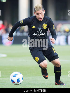 Columbus, USA. Mai 9, 2018: Columbus Crew Mittelfeldspieler Cristian Martinez (18) übernimmt den Ball gegen Philadelphia Union ihres Gleichen an Mapfre Stadion. Brent Clark/Alamy leben Nachrichten Stockfoto