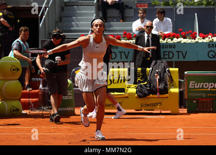 Madrid, Spanien. 10. Mai 2018. Caroline Garcia feiert Sieg nach Spitzeneinzel gegen Carla Suarez während ihrer ATP Madrid Open Umlauf von 16 Partie Tennis auf dem Caja Magica in Madrid. Credit: SOPA Images Limited/Alamy leben Nachrichten Stockfoto