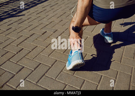 Verletzungen, Stretching, auf einen Lauf in einem runner Quetschung Stockfoto